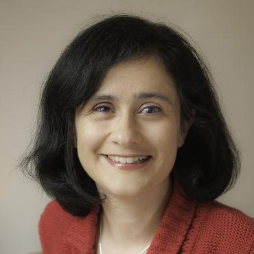 Headshot of Claudine