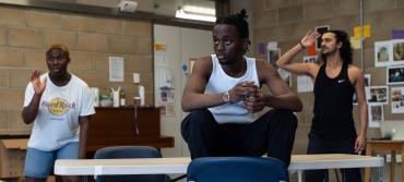 Students during rehearsals for Home