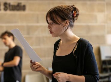 A LAMDA Shakespeare Summer School student holding a script